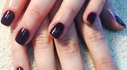 Dark polished nails showcased at Beauty Spot Salon, Port Elizabeth, Eastern Cape, ZA.