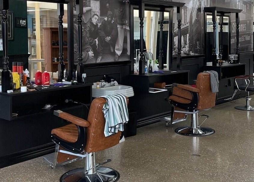 Chic interior of Brooklyn Barbers Echuca with vintage chairs at Echuca, Victoria, AU.