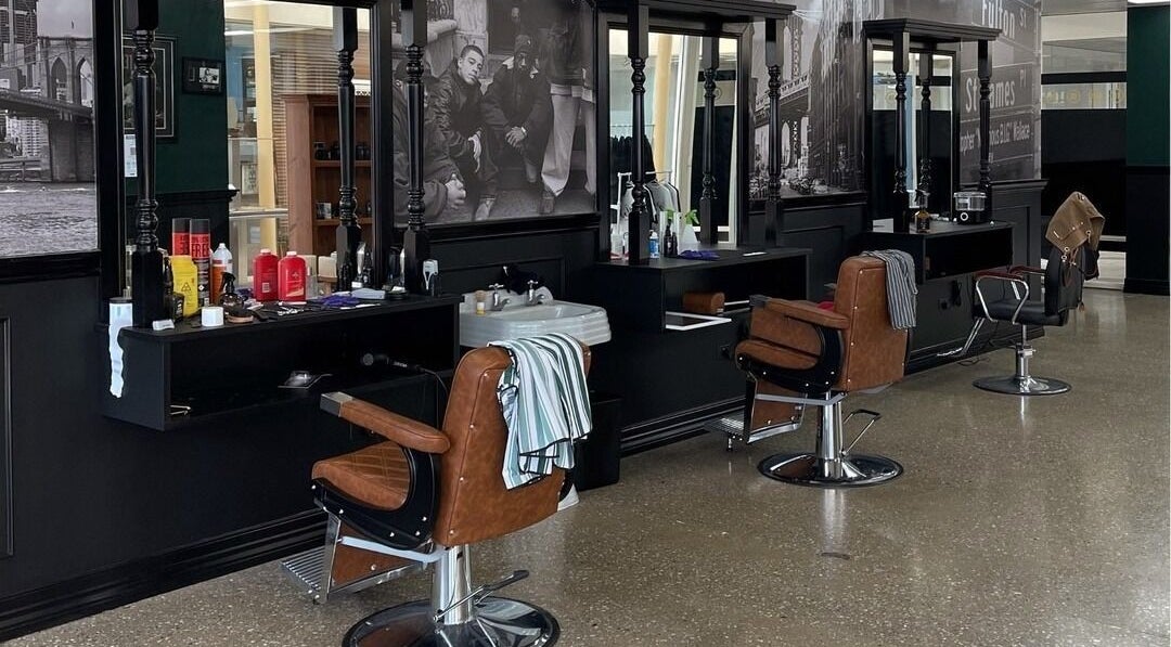 Chic interior of Brooklyn Barbers Echuca with vintage chairs at Echuca, Victoria, AU.