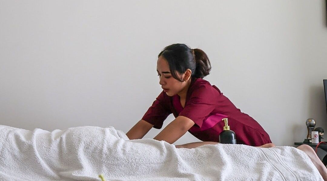 Therapist performing massage at Authentic Balinese Home Spa Massage jvc in Dubai, Dubai, AE.