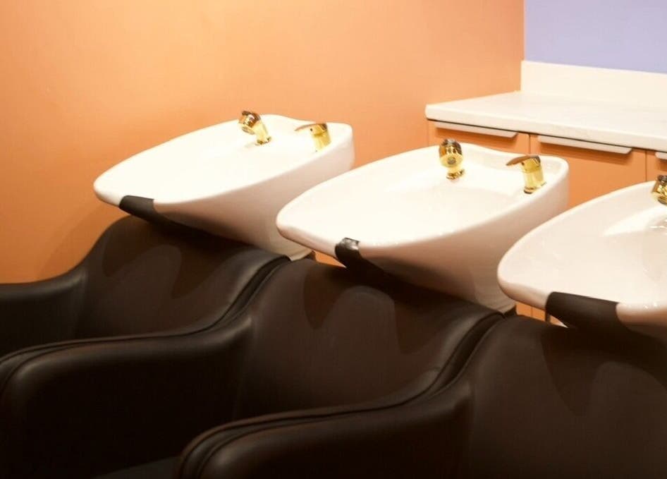 Modern hair wash basins at Hair by Joshuaa Shaun, Birmingham, England, GB offering a serene salon experience.