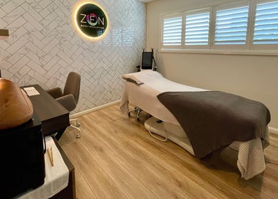Relaxing treatment room at Zen Body Sculpting, Melbourne, Victoria, AU with modern decor and ambient lighting.