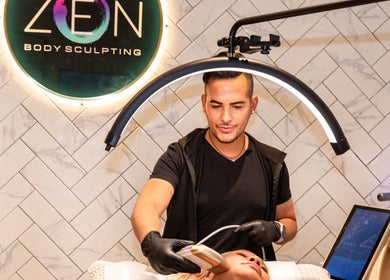 Expert performing body sculpting at Zen Body Sculpting, Melbourne, Victoria, AU. Modern wellness facility.