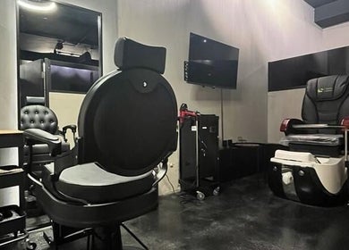 Modern salon suite at Obai Salon I صالون أبي in Jeddah, Makkah Province, SA, featuring sleek styling chairs.