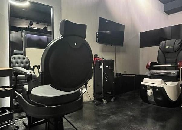 Modern salon suite at Obai Salon I صالون أبي in Jeddah, Makkah Province, SA, featuring sleek styling chairs.