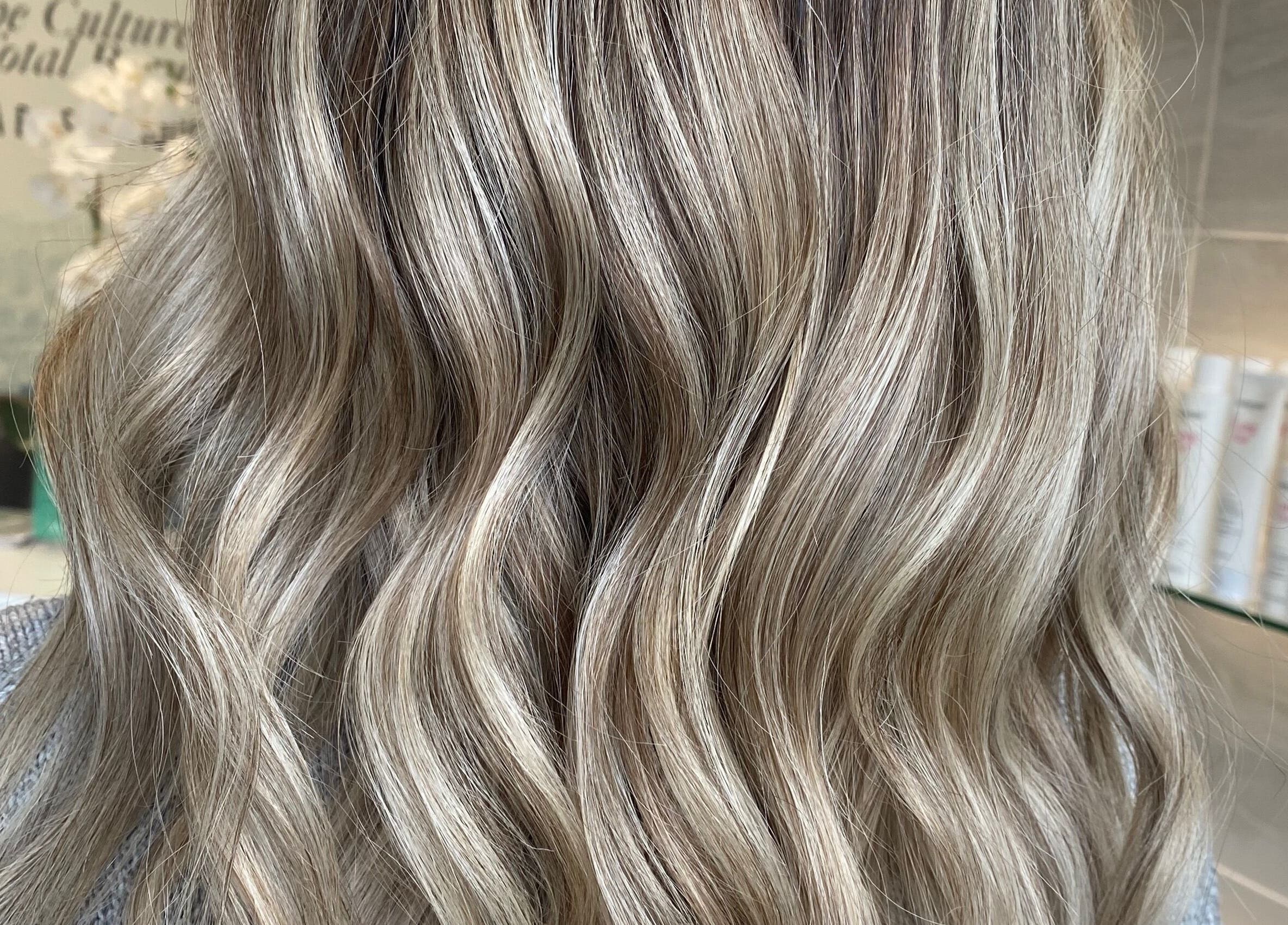 Stylish blonde waves at Ellena Emmans Hair Studio, Southampton, GB. Experience premium hair services.