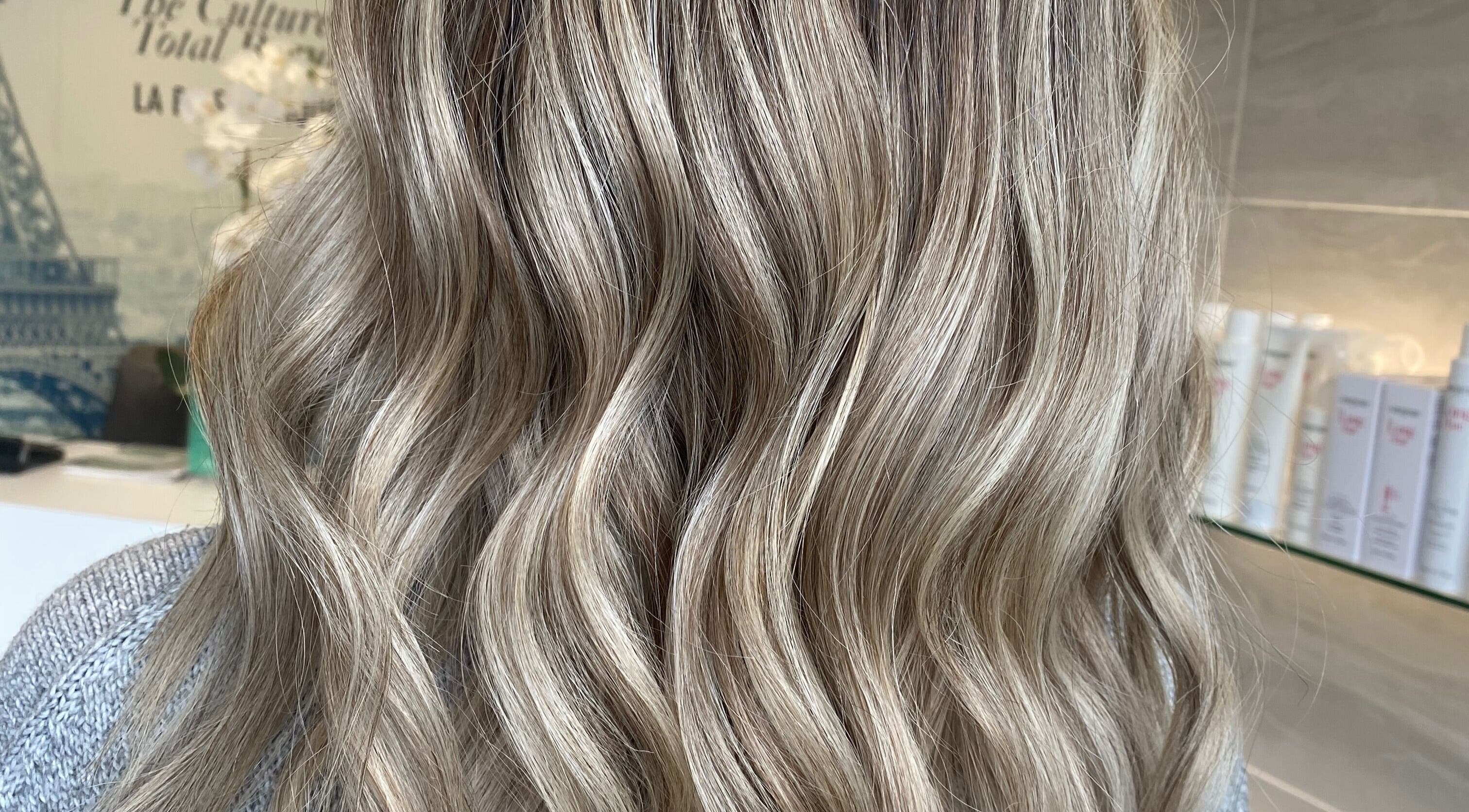 Stylish blonde waves at Ellena Emmans Hair Studio, Southampton, GB. Experience premium hair services.