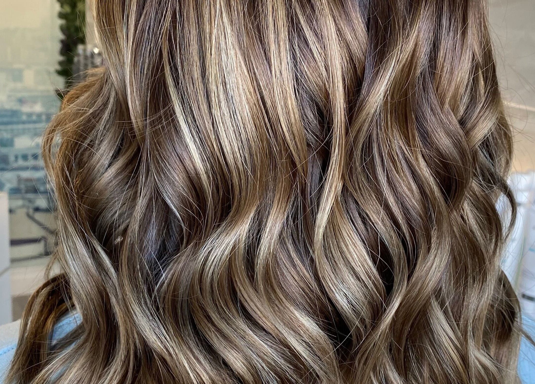 Beautiful wavy hair styled at Ellena Emmans Hair Studio in Southampton, GB, showcasing expert hair craftsmanship.