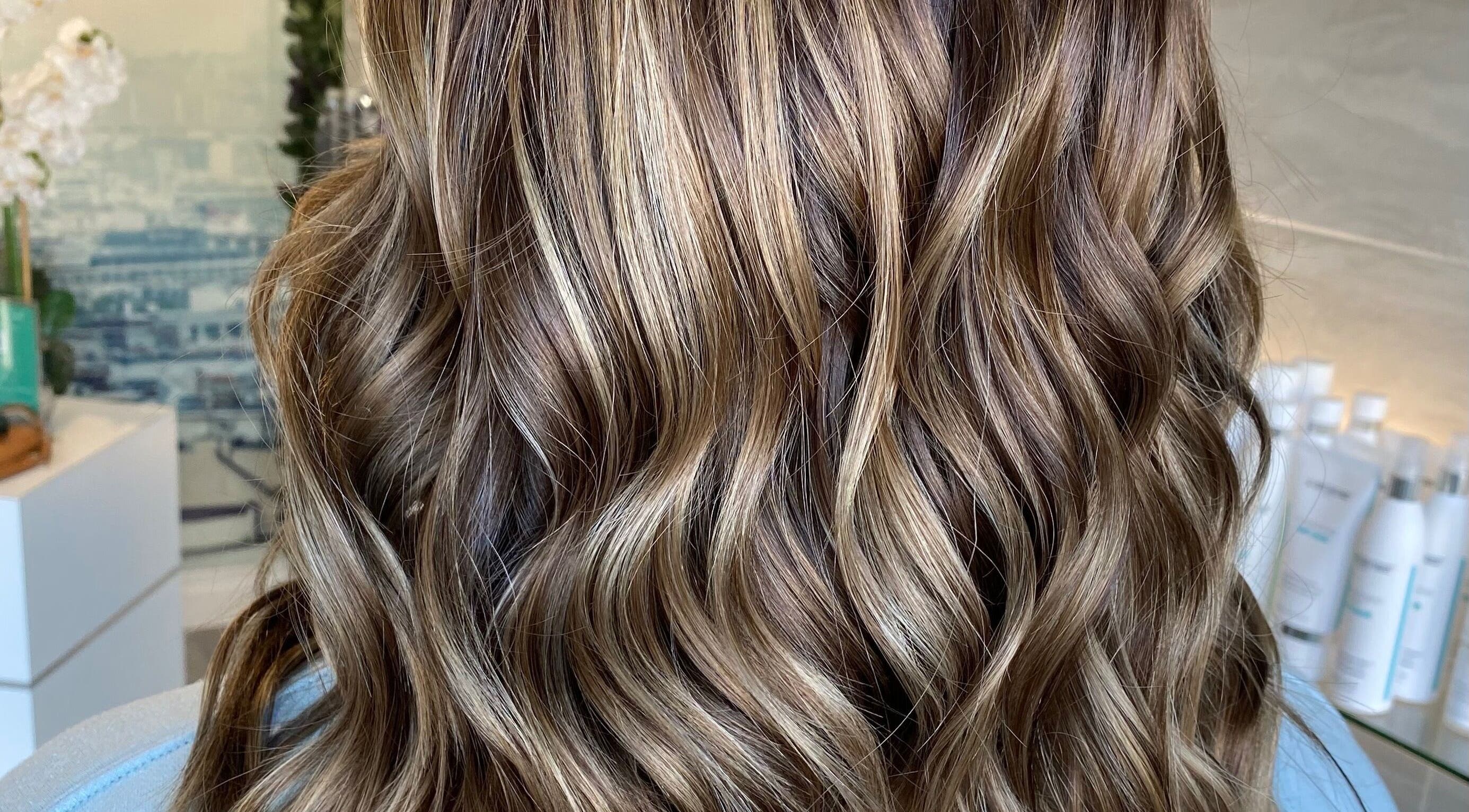 Beautiful wavy hair styled at Ellena Emmans Hair Studio in Southampton, GB, showcasing expert hair craftsmanship.