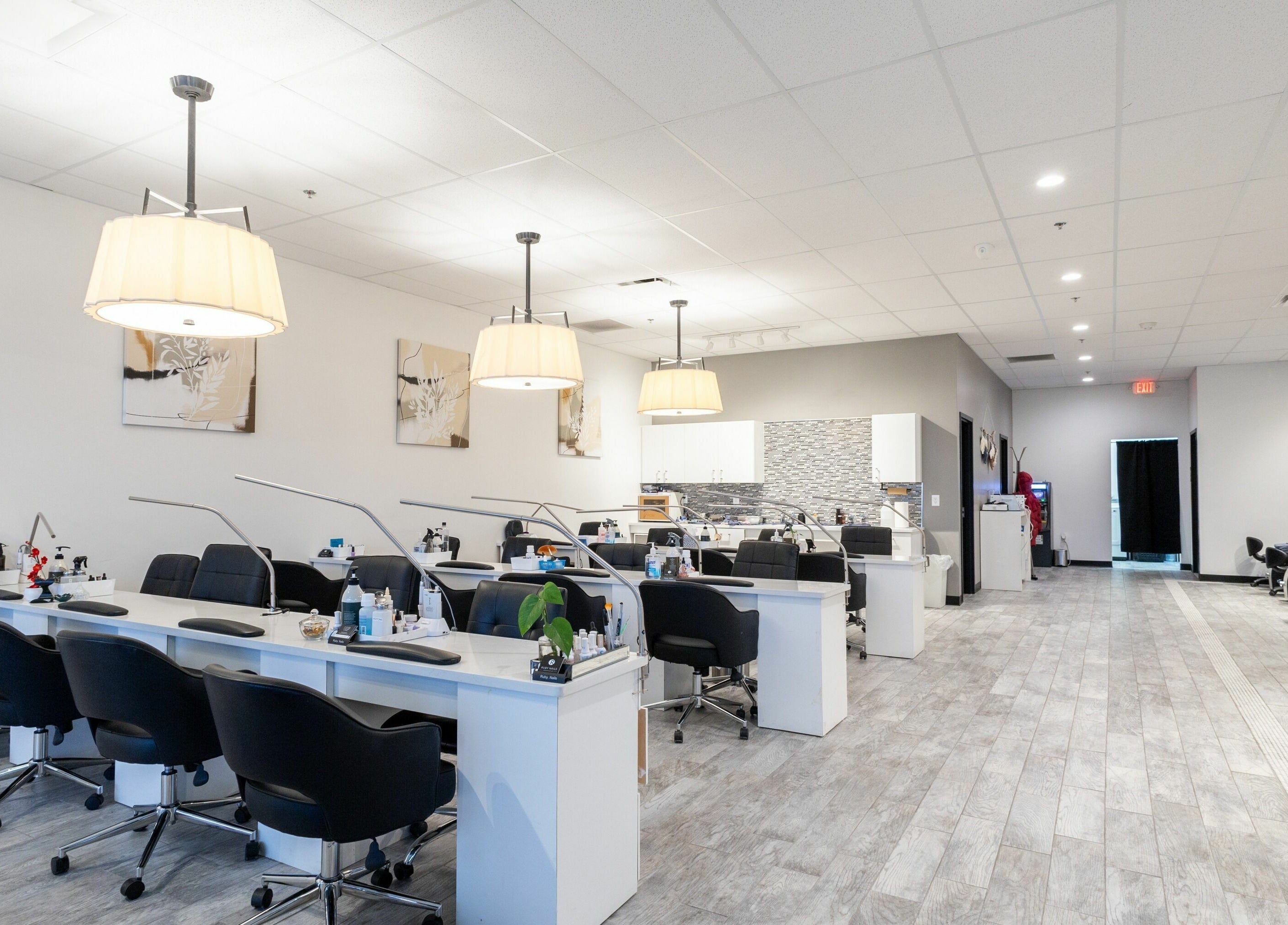 Spacious nail salon at Ruby Nails, Brookfield, Wisconsin, with modern stations and elegant lighting.