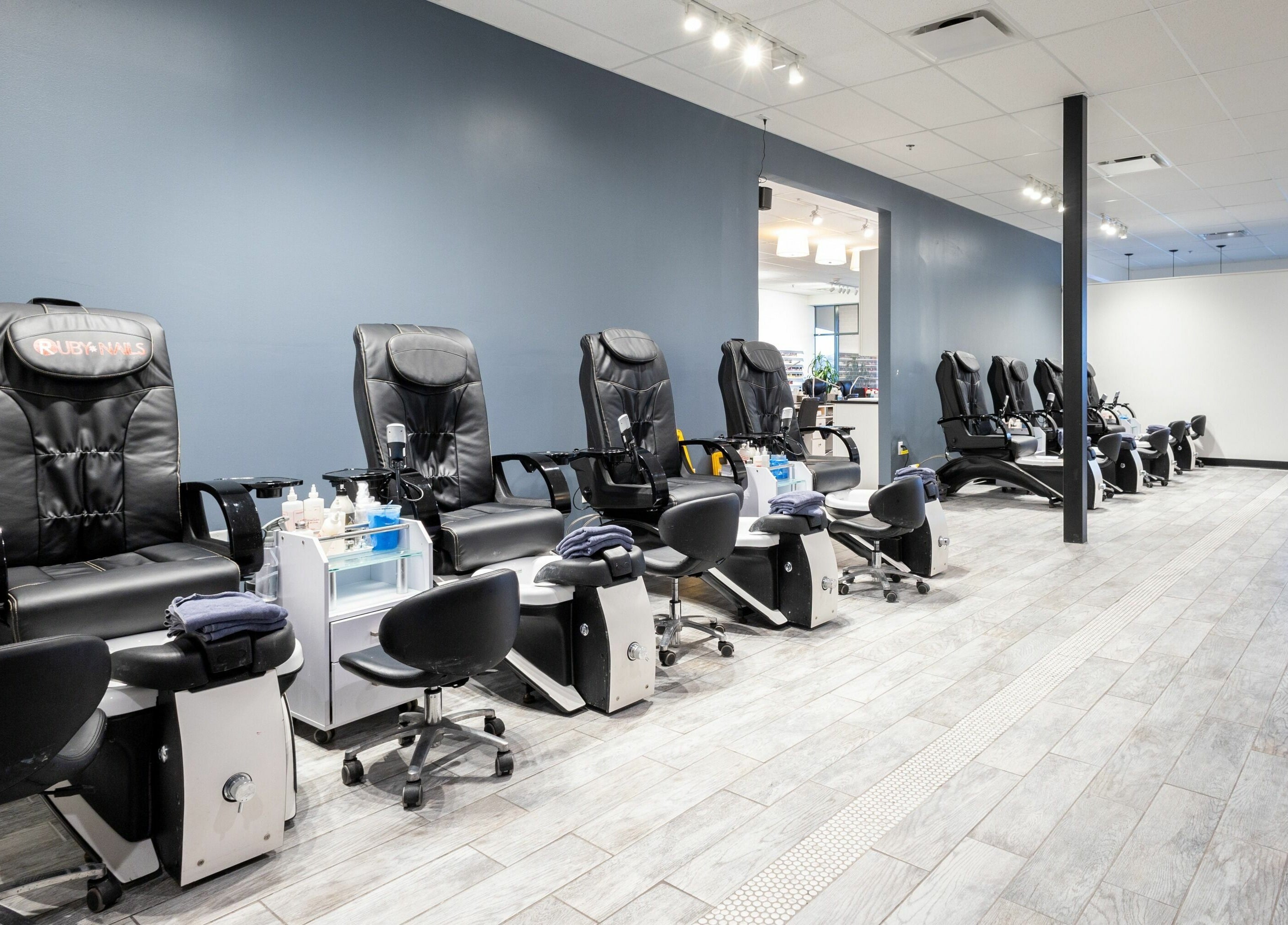 Spacious pedicure chairs at Ruby Nails, Brookfield, Wisconsin, US, offering a relaxing experience.