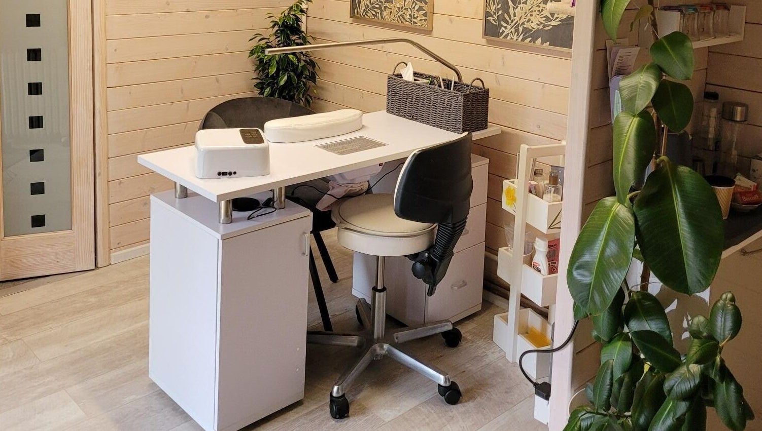Nail spa interior at Holistic Healing & Wellbeing, Peterborough, England, GB with modern decor and plant accents.