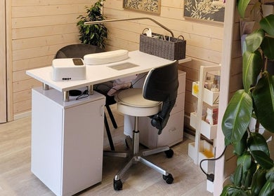 Nail spa interior at Holistic Healing & Wellbeing, Peterborough, England, GB with modern decor and plant accents.