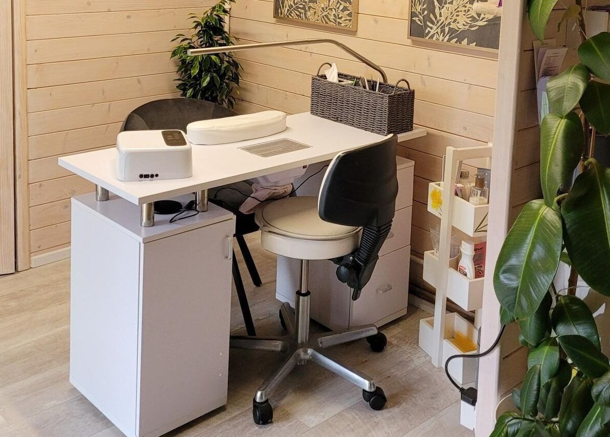 Nail spa interior at Holistic Healing & Wellbeing, Peterborough, England, GB with modern decor and plant accents.