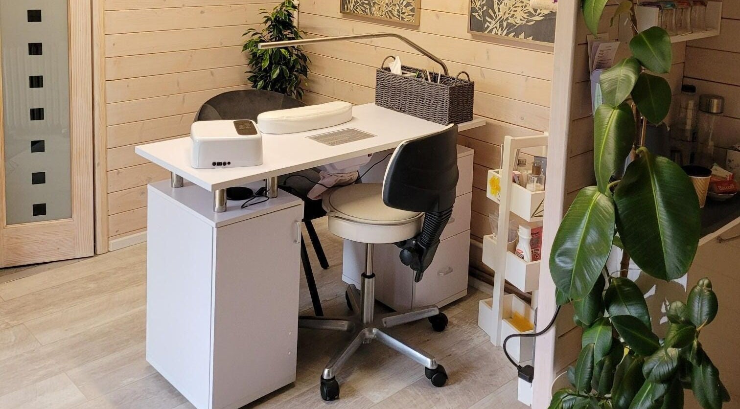 Nail spa interior at Holistic Healing & Wellbeing, Peterborough, England, GB with modern decor and plant accents.