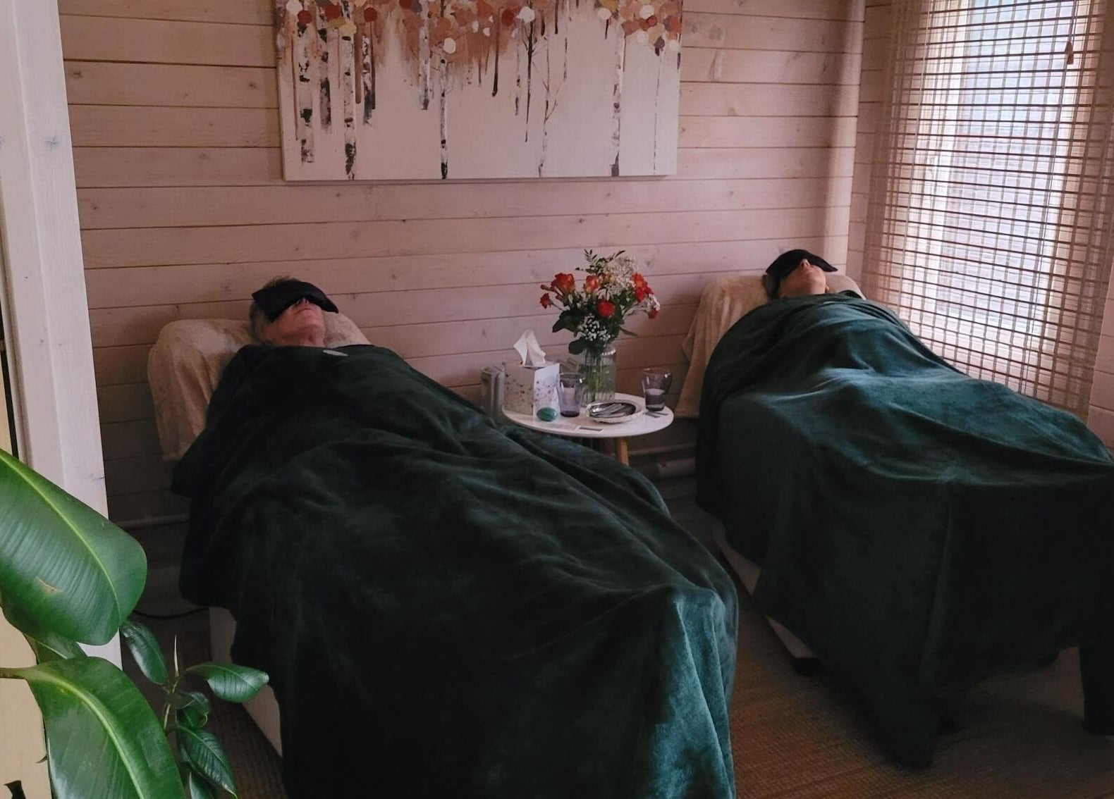 Relaxation room at Holistic Healing & Wellbeing, Peterborough, England, GB with two guests resting under blankets.
