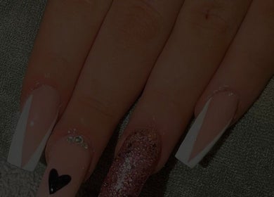 Elegant manicured nails with heart design at beautified by ella, Preston, England, GB.