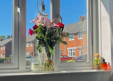 Sunny window with flowers at Beautified by Ella, Preston, England, GB.