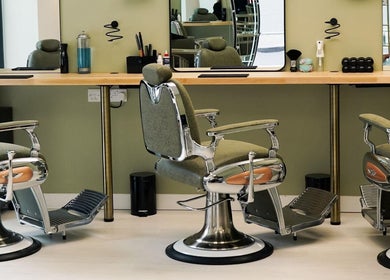 Modern salon chairs at Garcia Hair Lounge, London, England, GB reflect sleek design and comfort.