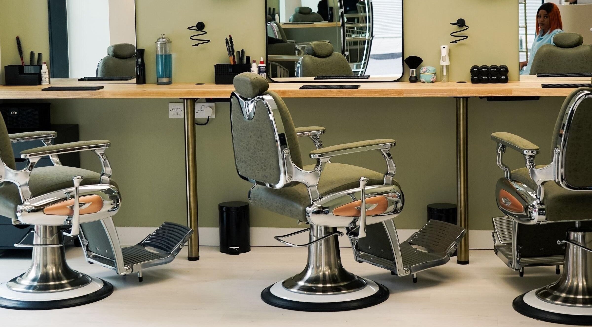 Modern salon chairs at Garcia Hair Lounge, London, England, GB reflect sleek design and comfort.