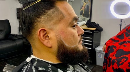 Client receives a precise beard trim at Rayzor Crisp Cutz in Los Angeles, California, US.