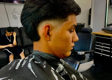 Side view of a classic fade haircut at Rayzor Crisp Cutz, Los Angeles, California, US.