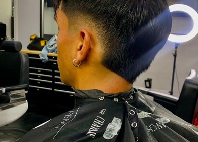 Close-up of a modern fade haircut at Rayzor Crisp Cutz, Los Angeles, California, US.
