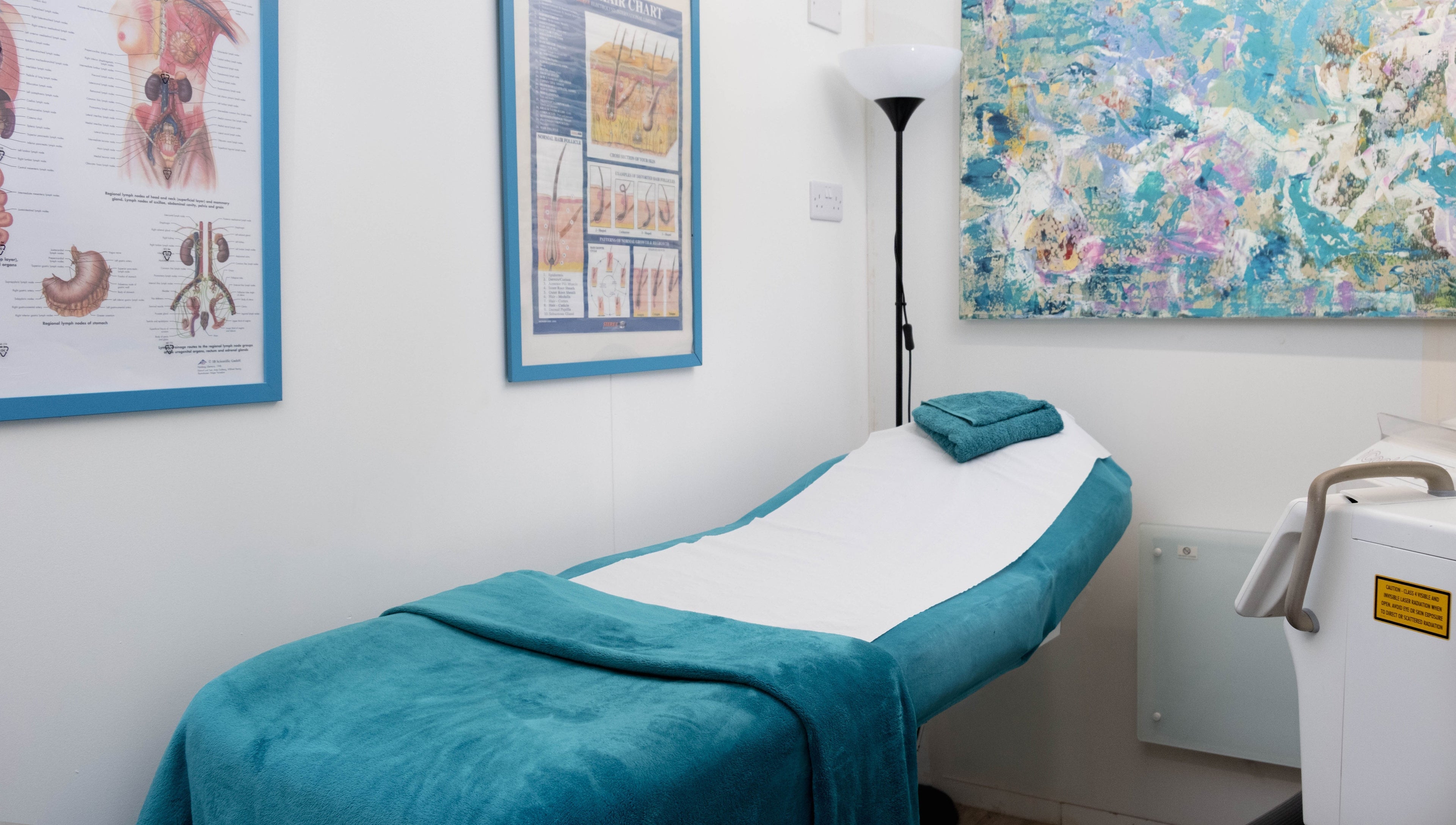 Relaxing treatment room at My Brazilian Wax, London, England, GB with a soothing ambiance and spa bed.