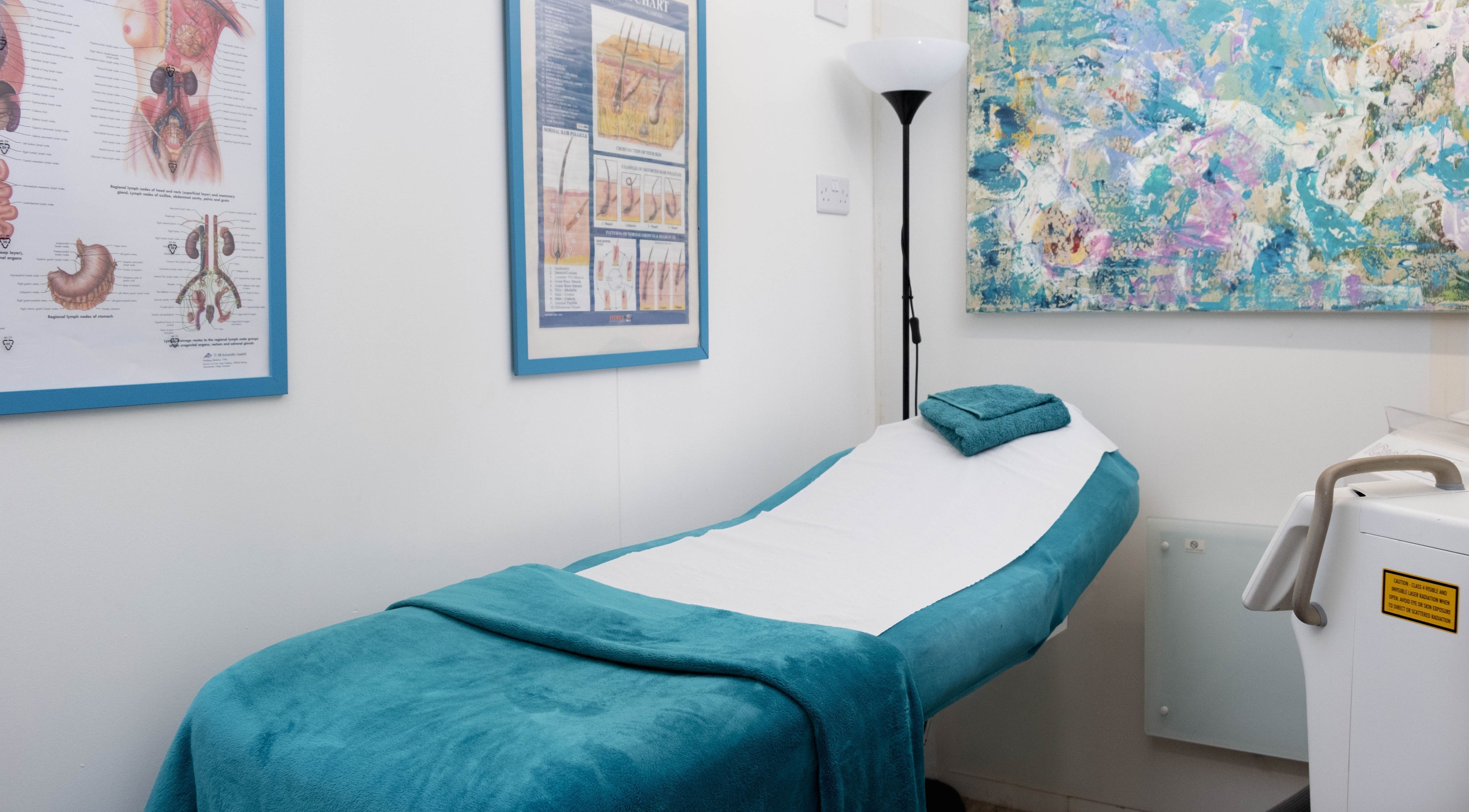 Relaxing treatment room at My Brazilian Wax, London, England, GB with a soothing ambiance and spa bed.