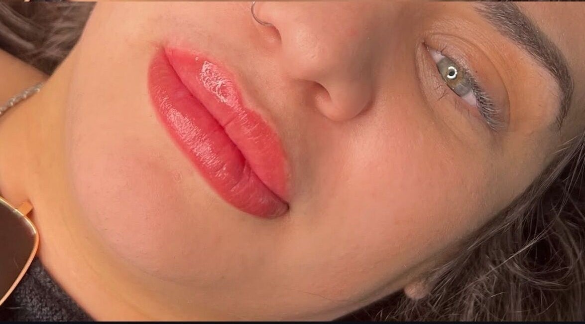 Close-up of glossy lips at Glow and Go, Harwich, England, GB, showcasing beauty services.