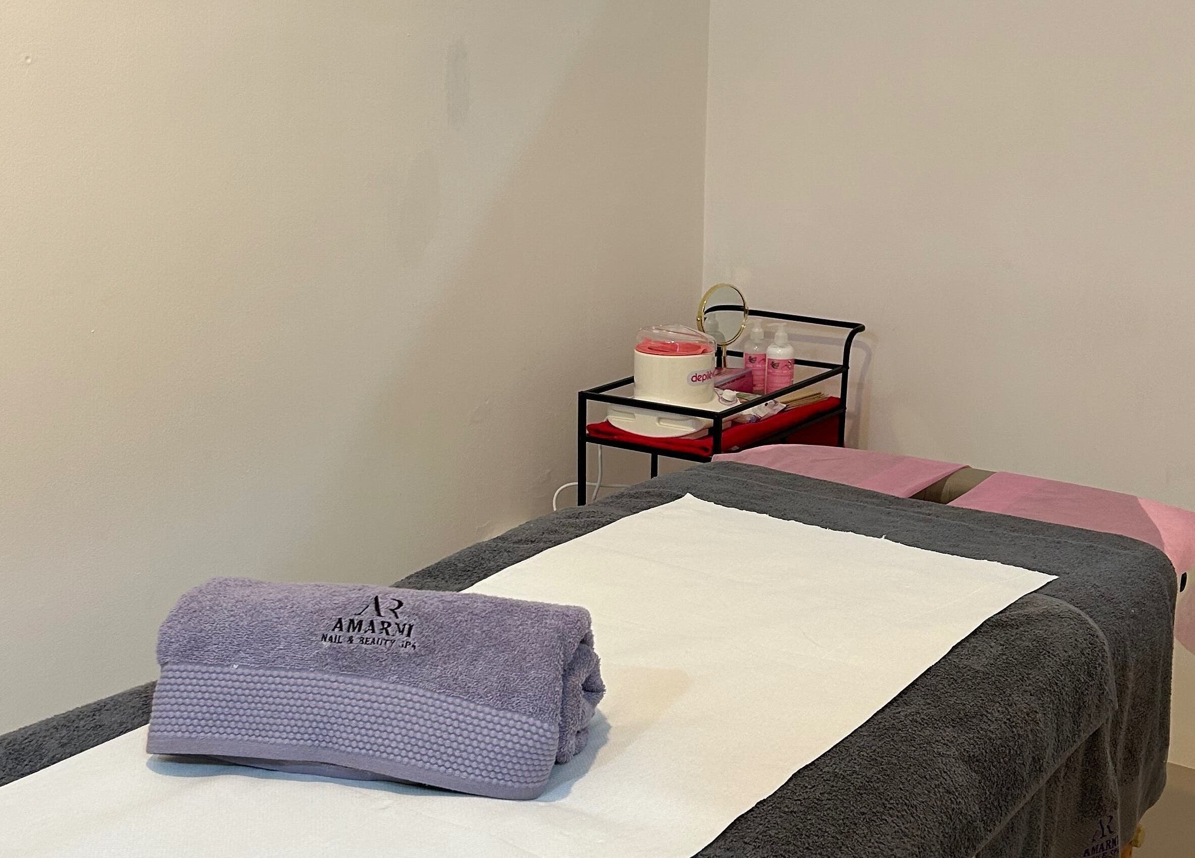 Serene spa room at Amarni Nail & Beauty Spa, Cape Town, Western Cape, ZA showcasing a neatly arranged treatment area.