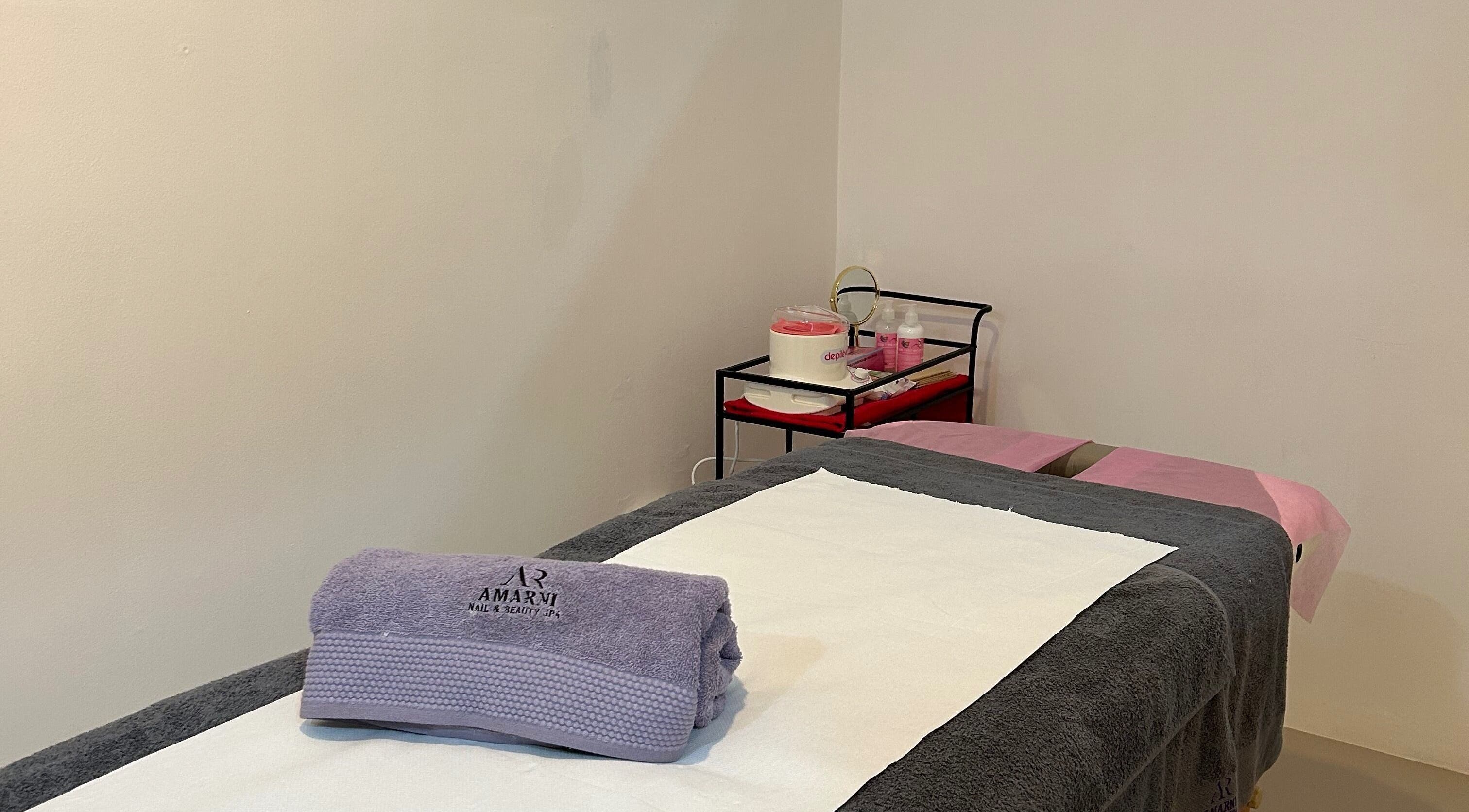 Serene spa room at Amarni Nail & Beauty Spa, Cape Town, Western Cape, ZA showcasing a neatly arranged treatment area.