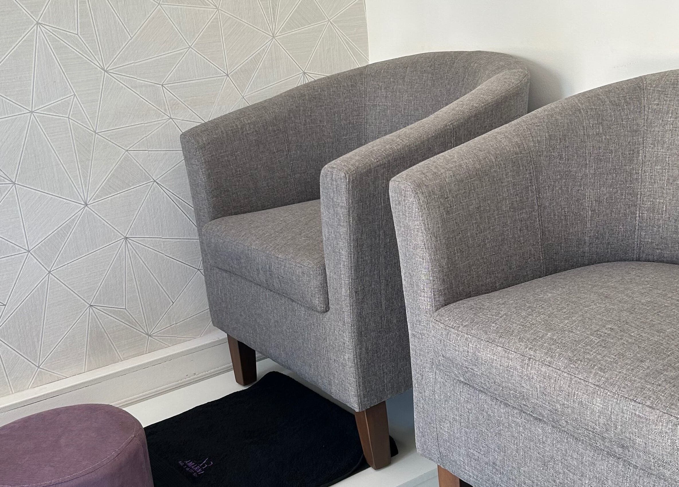 Stylish chairs at Amarni Nail & Beauty Spa, Cape Town, Western Cape, ZA, offer ultimate relaxation.