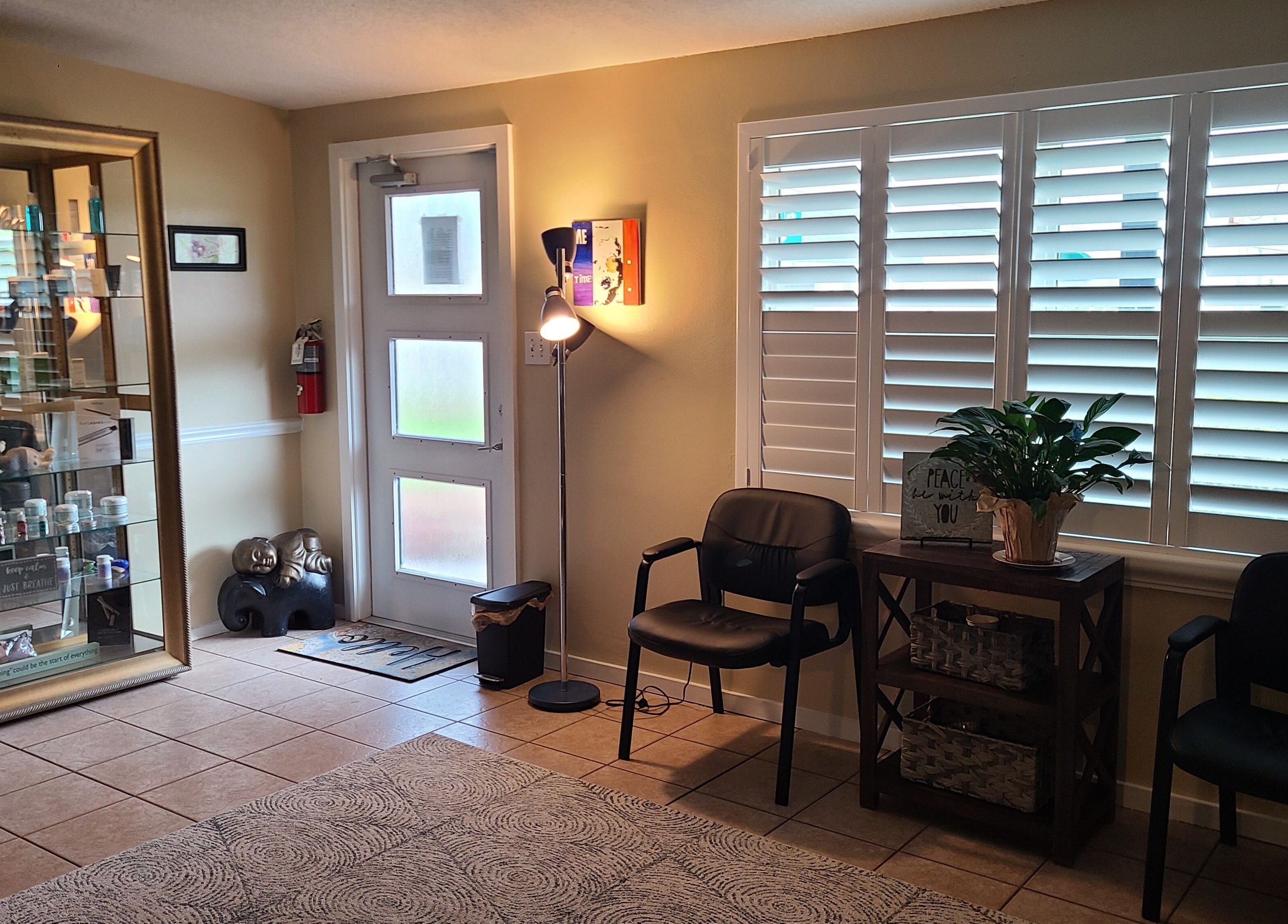Inviting lobby at The Muscle Whisperer, New Port Richey, Florida, US with cozy seating and elegant decor.