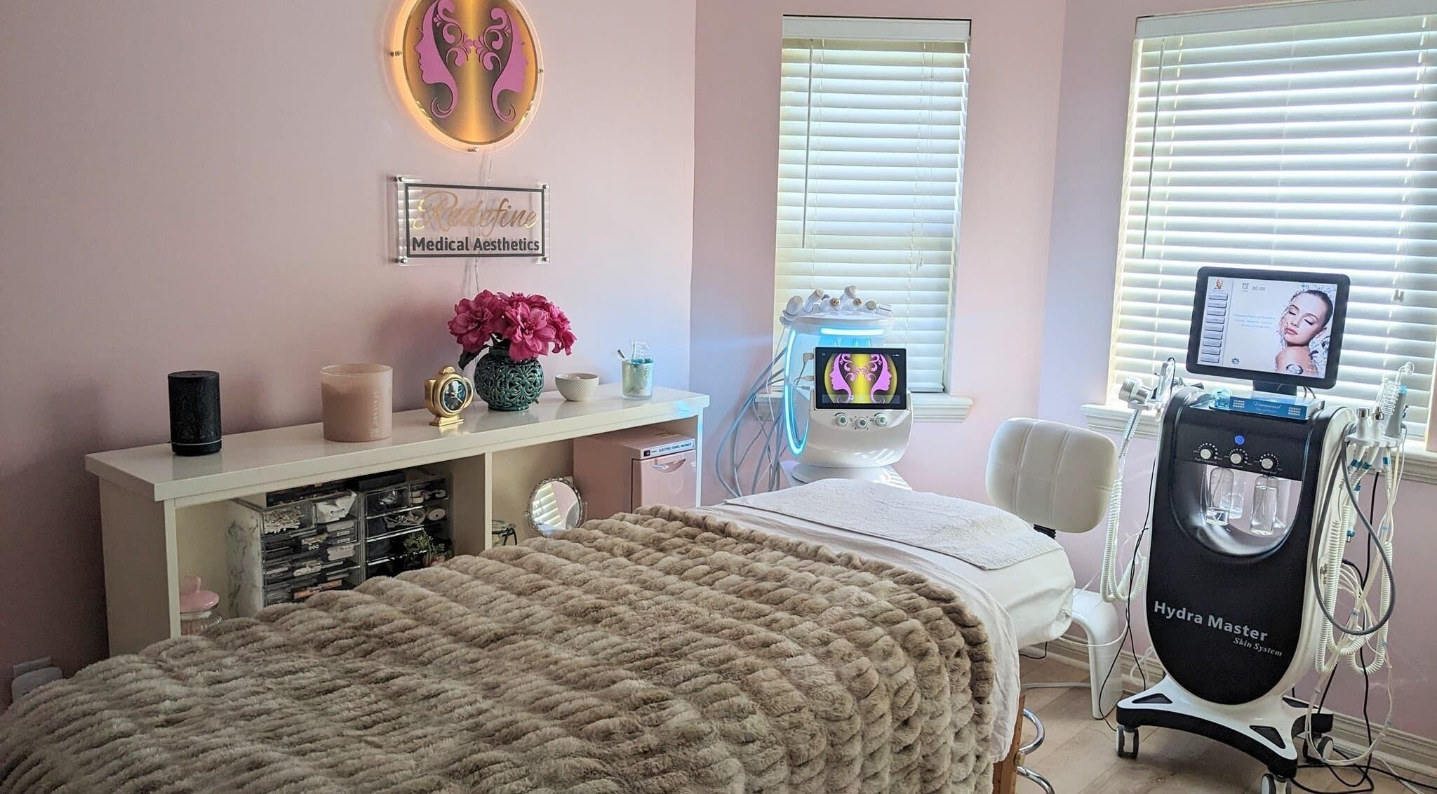 Cozy treatment room at Redefine Medical Aesthetics West Kelowna, BC, CA with advanced skincare equipment.