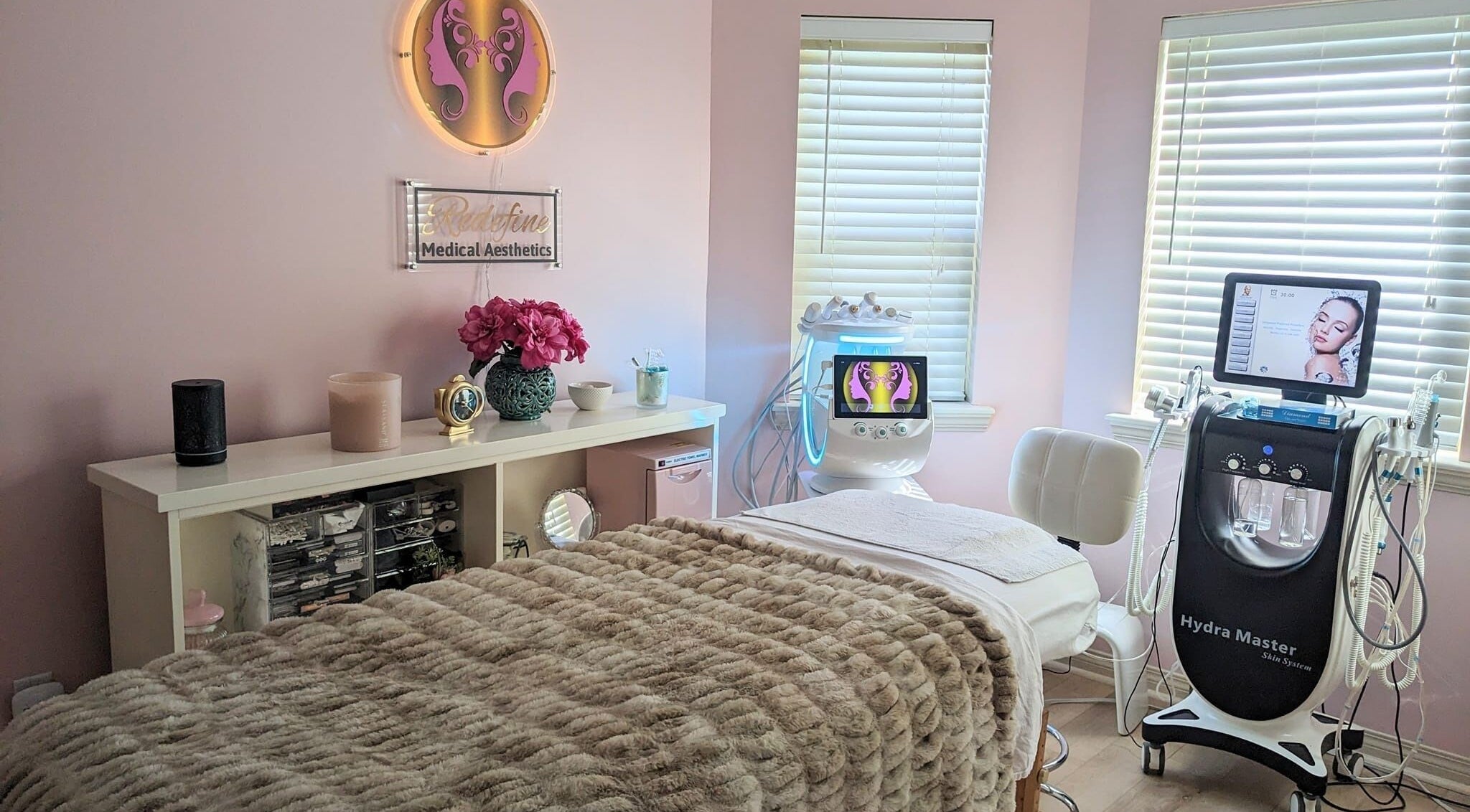 Cozy treatment room at Redefine Medical Aesthetics West Kelowna, BC, CA with advanced skincare equipment.