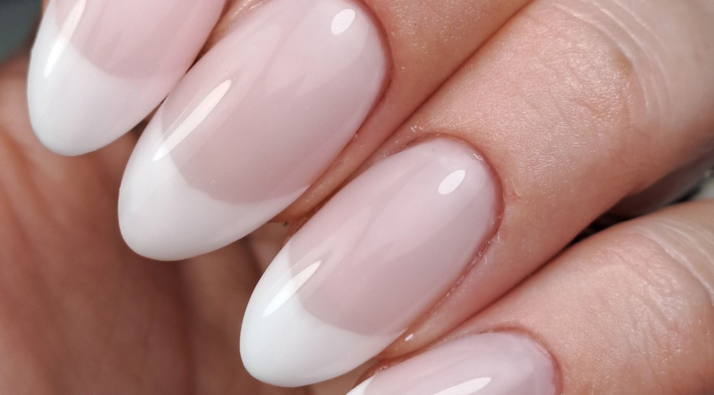 Elegant French nails by Kerry Collett Nails, Galgate, England, GB showcase expert craftsmanship.