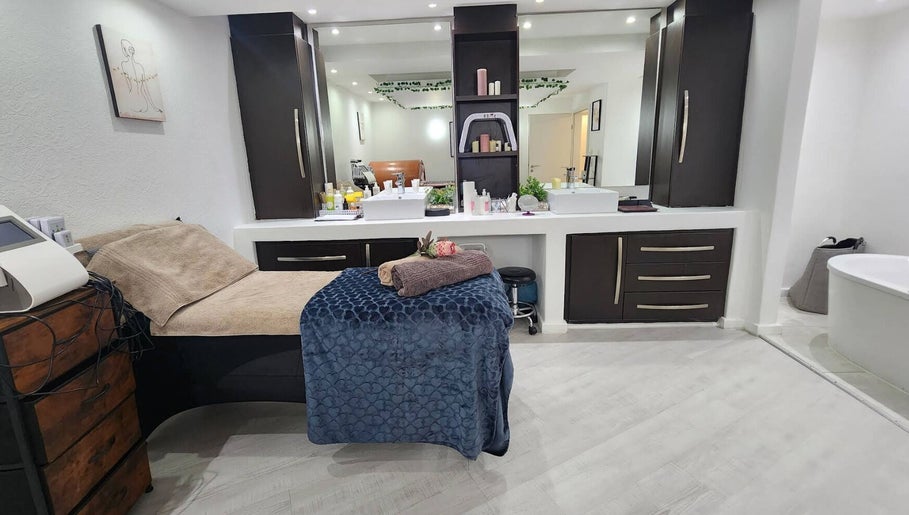 Luxurious spa room at 50 Shades of Beauty and Slimming in Cape Town, Western Cape, ZA featuring relaxing decor.