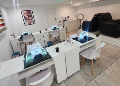 Elegant nail salon interior at 50 Shades of Beauty and Slimming, Cape Town, Western Cape, ZA, with modern manicure stations.