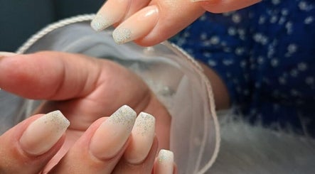 Elegant nude nails with glitter tips at 50 Shades of Beauty and Slimming, Cape Town, Western Cape, ZA.