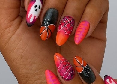 Halloween-themed nail art with spider webs at 50 Shades of Beauty and Slimming, Cape Town, Western Cape, ZA.