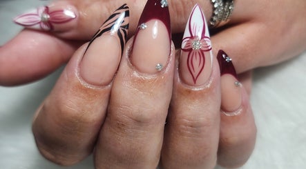 Close-up of elegant floral nail art at 50 Shades of Beauty and Slimming, Cape Town, Western Cape, ZA.