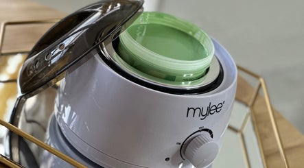 Elegant wax warmer at Glam By Grace in Kings Langley, England, GB enhances your beauty experience.