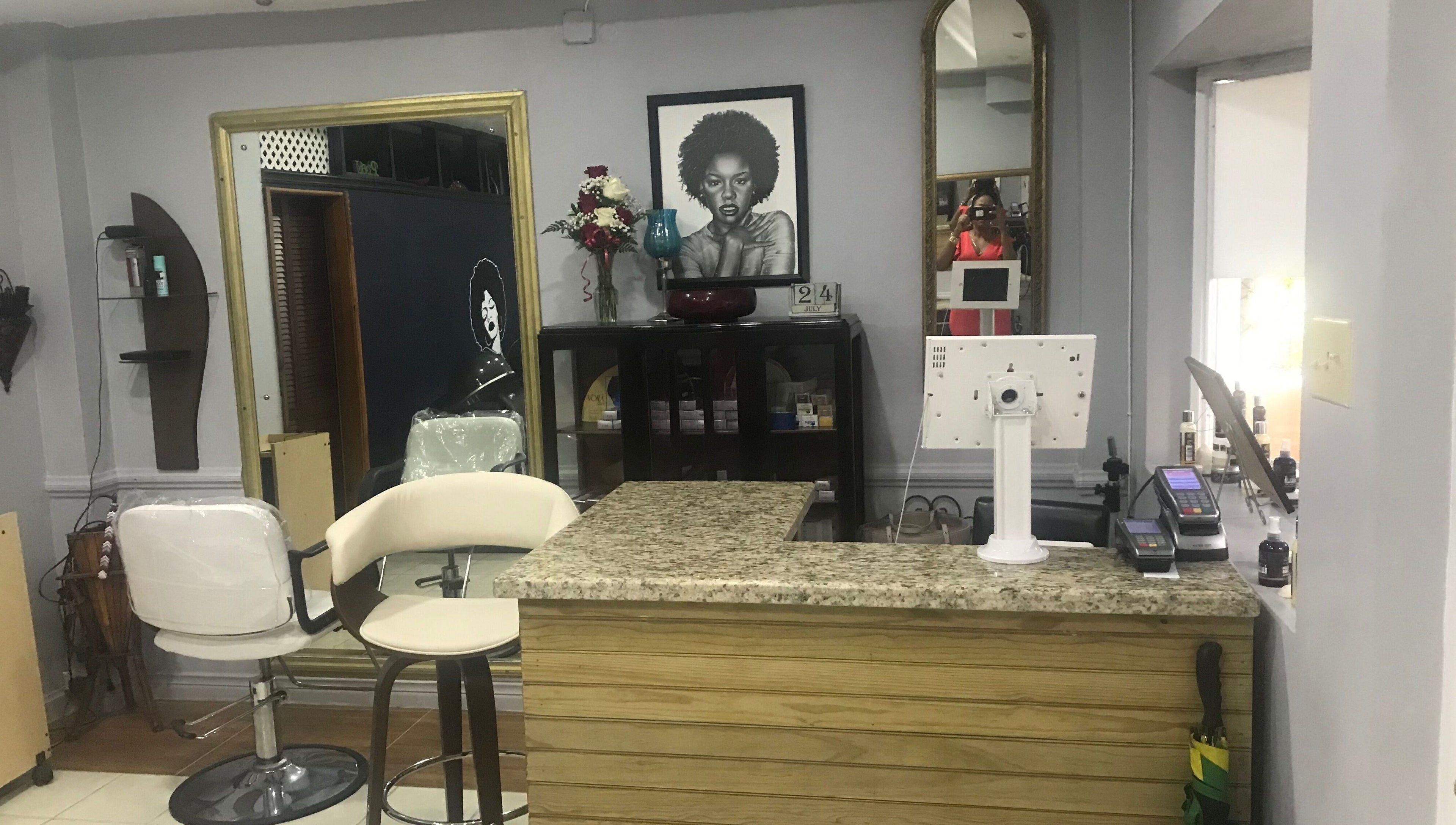 Reception area of The Salon Hair and Scalp Clinic Ja Ltd in Kingston, St. Andrew Parish, JM with stylish decor.