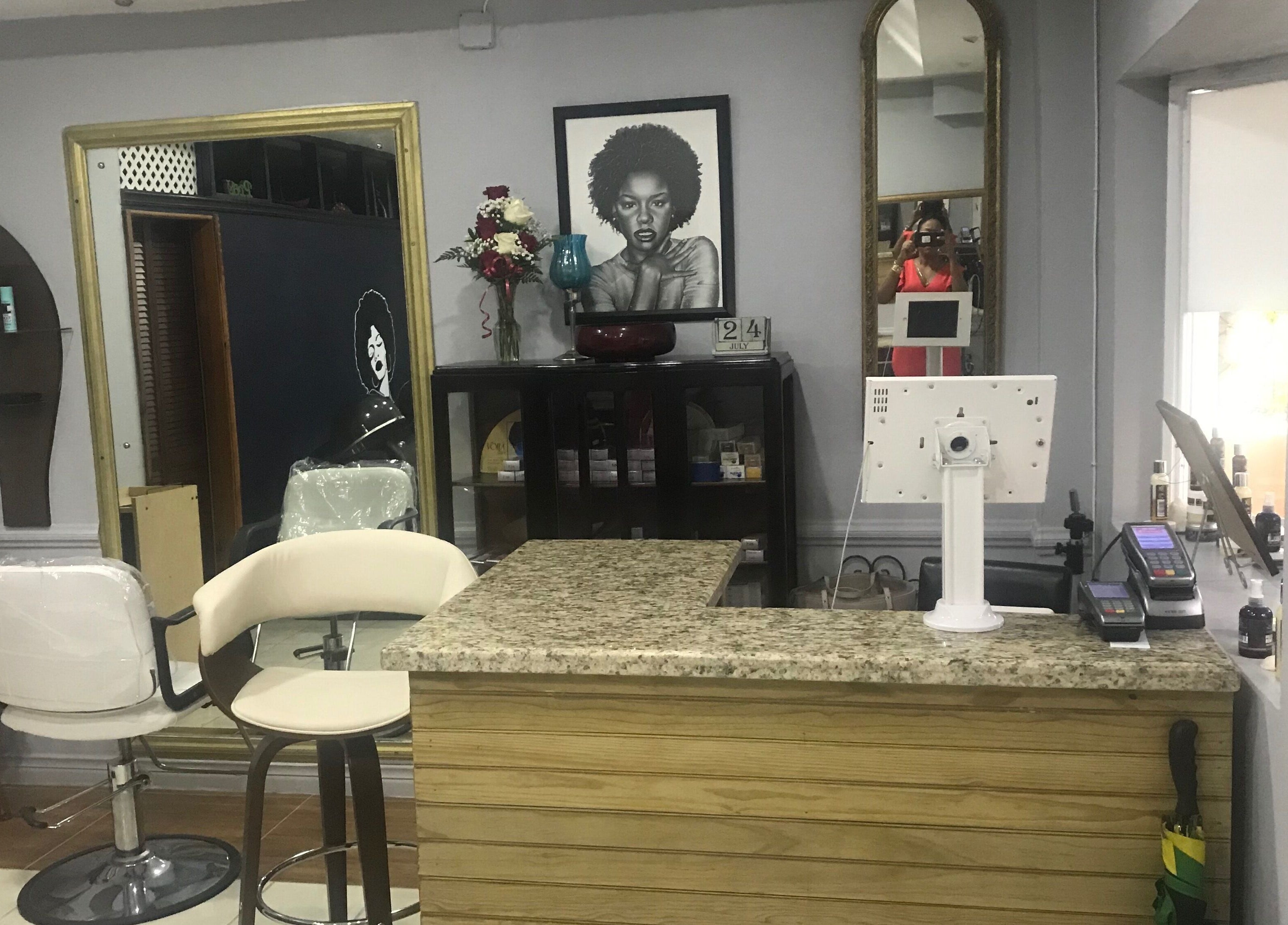 Reception area of The Salon Hair and Scalp Clinic Ja Ltd in Kingston, St. Andrew Parish, JM with stylish decor.