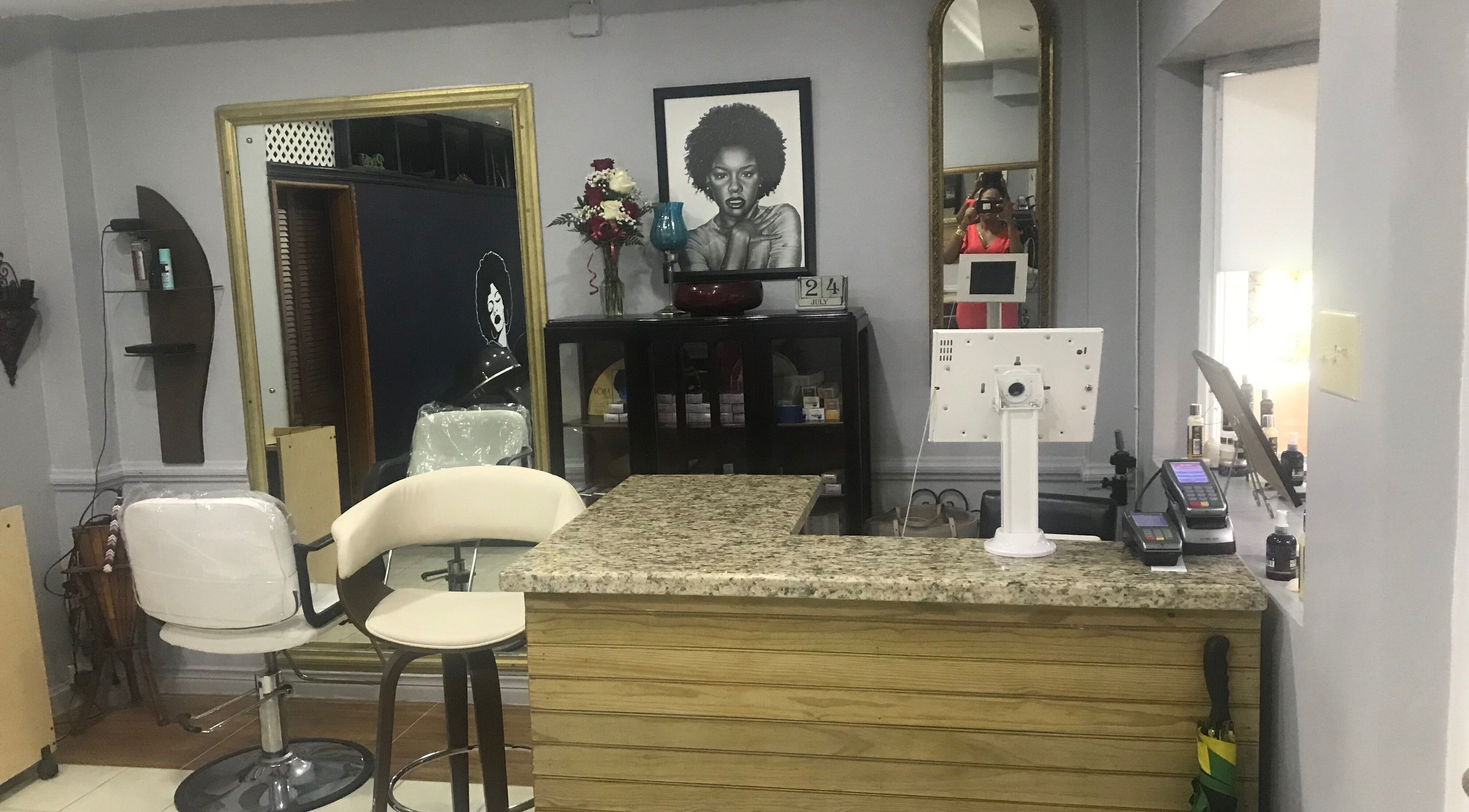 Reception area of The Salon Hair and Scalp Clinic Ja Ltd in Kingston, St. Andrew Parish, JM with stylish decor.