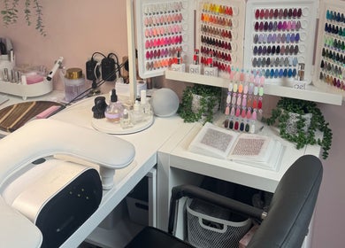Nail station at Utopia Beauty Farnham in Farnham, England, GB, featuring gel colors and manicure tools.
