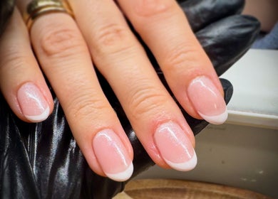 Close-up of elegant French manicure at Utopia Beauty Farnham, Farnham, England, GB.