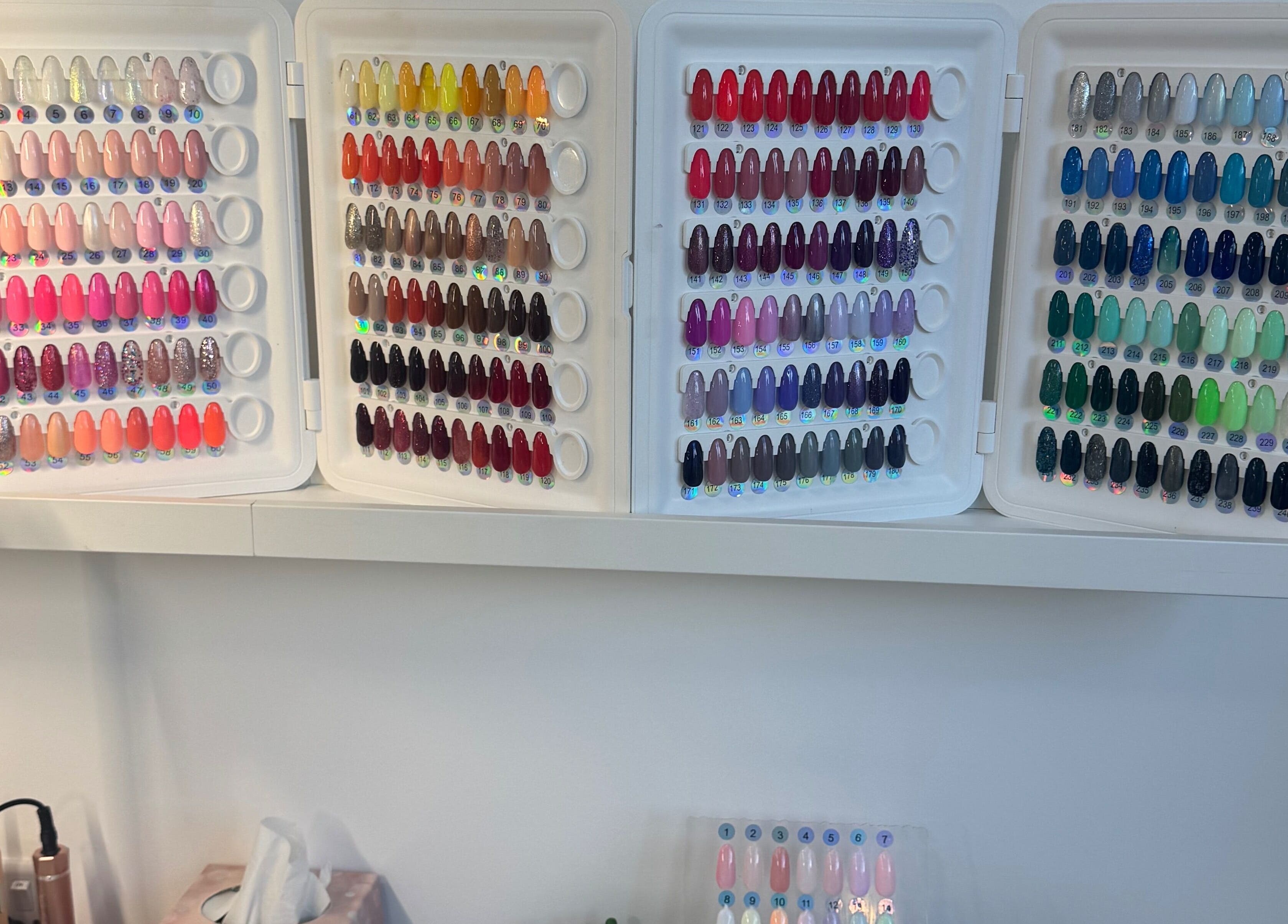Vibrant nail color palette at Utopia Beauty Farnham, Farnham, England, GB.