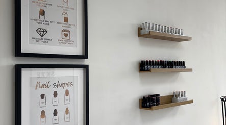 Nails by Skye wall with nail care tips and polish shelves, Paisley, Scotland, GB.